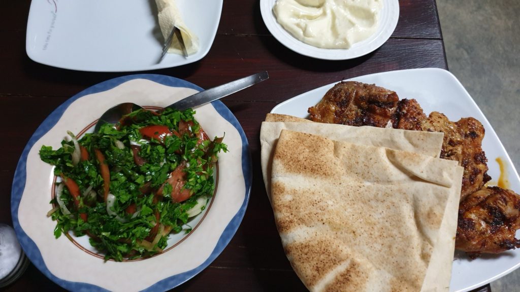 half chicken and salad at Armenis Halal Restaurant Paphos Cyprus